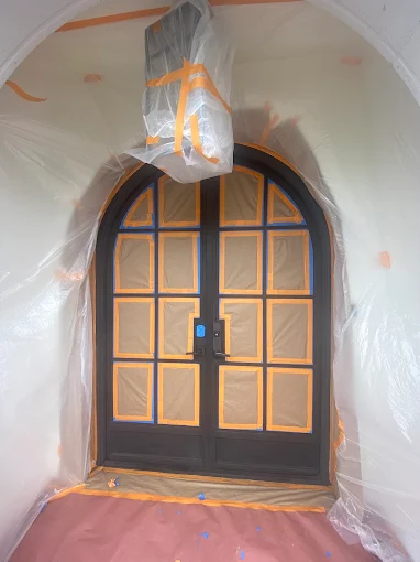 Exterior door masked and painted by JC Painting